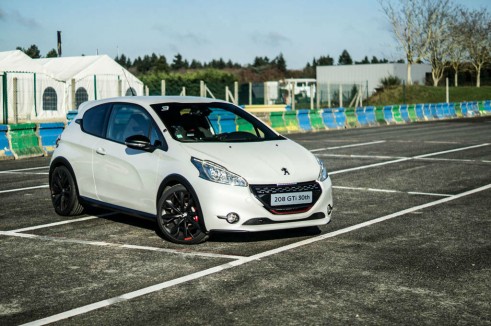 White Peugeot 208 GTI 30th Anniversary - Front Angle Dist - carwitter