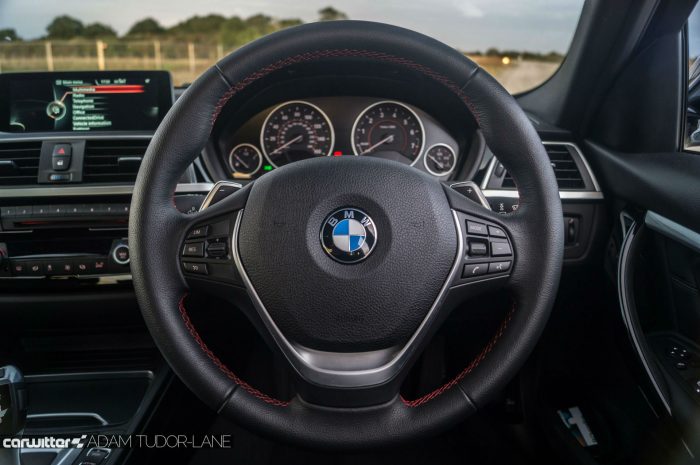 2016-bmw-330e-edrive-review-steering-wheel-carwitter